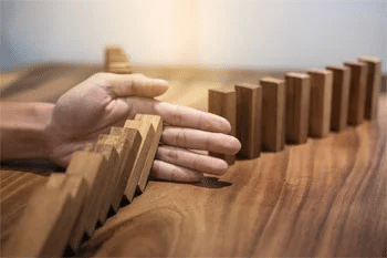 Remove black magic, hand stopping wood dominoes from falling.