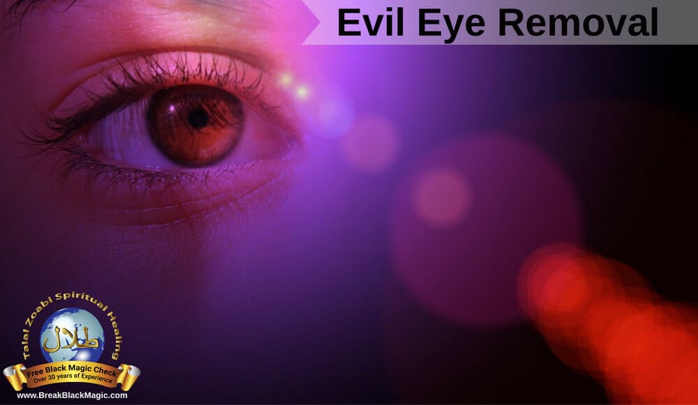 Evil eye removal, woman's brown eye in purple light.