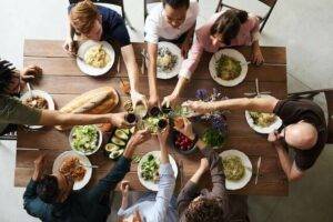 Family eating at a table with a ancestral curse