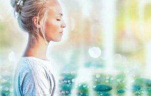 Woman sitting clearing dark energies.