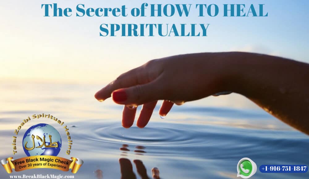 How to heal spiritually, a hand touching a lake with it's finger tips.