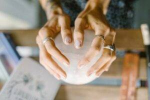 Magic healer holding a crystal ball.
