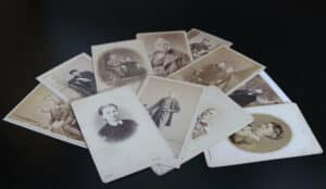 Break curses for old family photos on table.