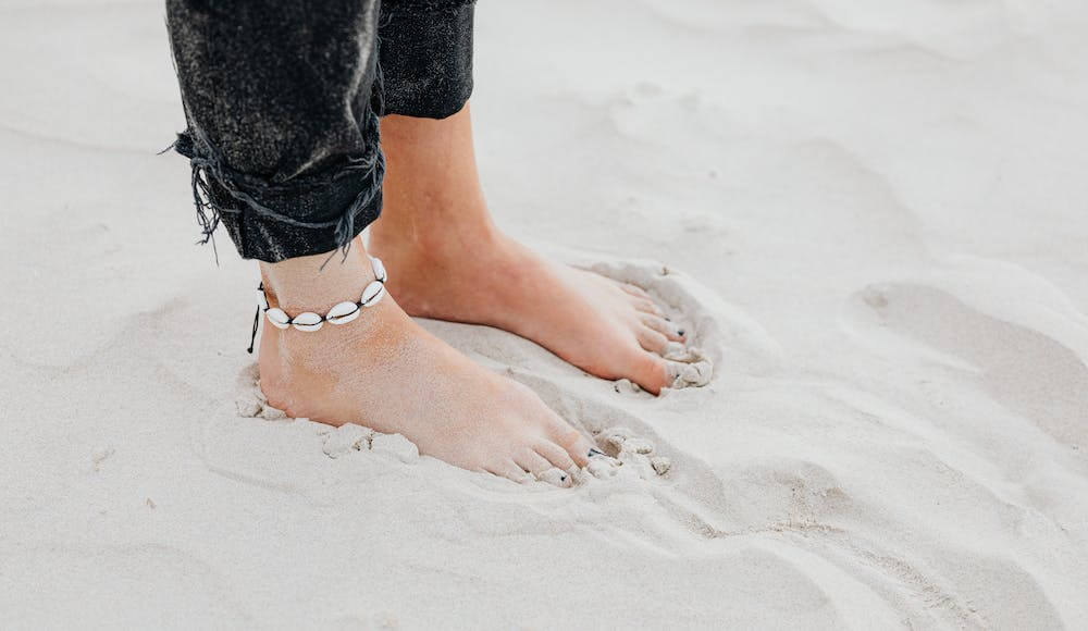 Feet in the sand. Signs good luck is coming.